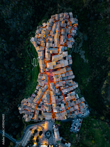 Obraz na płótnie View from above, stunning aerial view of the village of Vitorchiano at dusk. Vitorchiano is a medieval Italian village in Viterbo Province, Lazio, Italy. w salonie