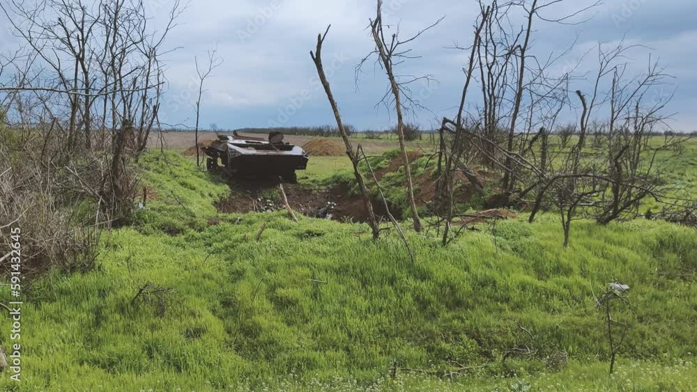 Russian tank or bmp destroyed by the Ukrainian military during the invasion of Ukraine. The remains of a blown up Russian tank in the Kherson region, Ukraine 2022 - 2023. The tank is covered with rust Russian tank or bmp destroyed by the Ukrainian military during the invasion of Ukraine. The remains of a blown up Russian tank in the Kherson region, Ukraine 2022 - 2023. The tank is covered with rust