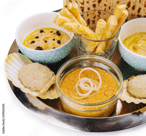 aperitif with hummus, mincemeat and pike caviar photo