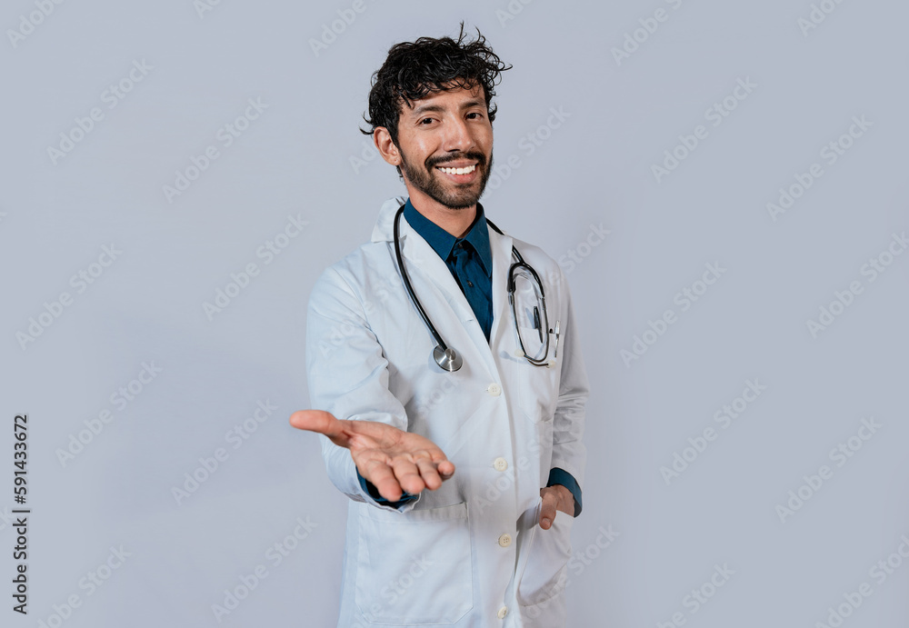 Smiling doctor extending hand in welcome. Young doctor extending hand to camera, Smiling doctor extending hand isolated Smiling doctor extending hand in welcome. Young doctor extending hand to camera, Smiling doctor extending hand isolated
