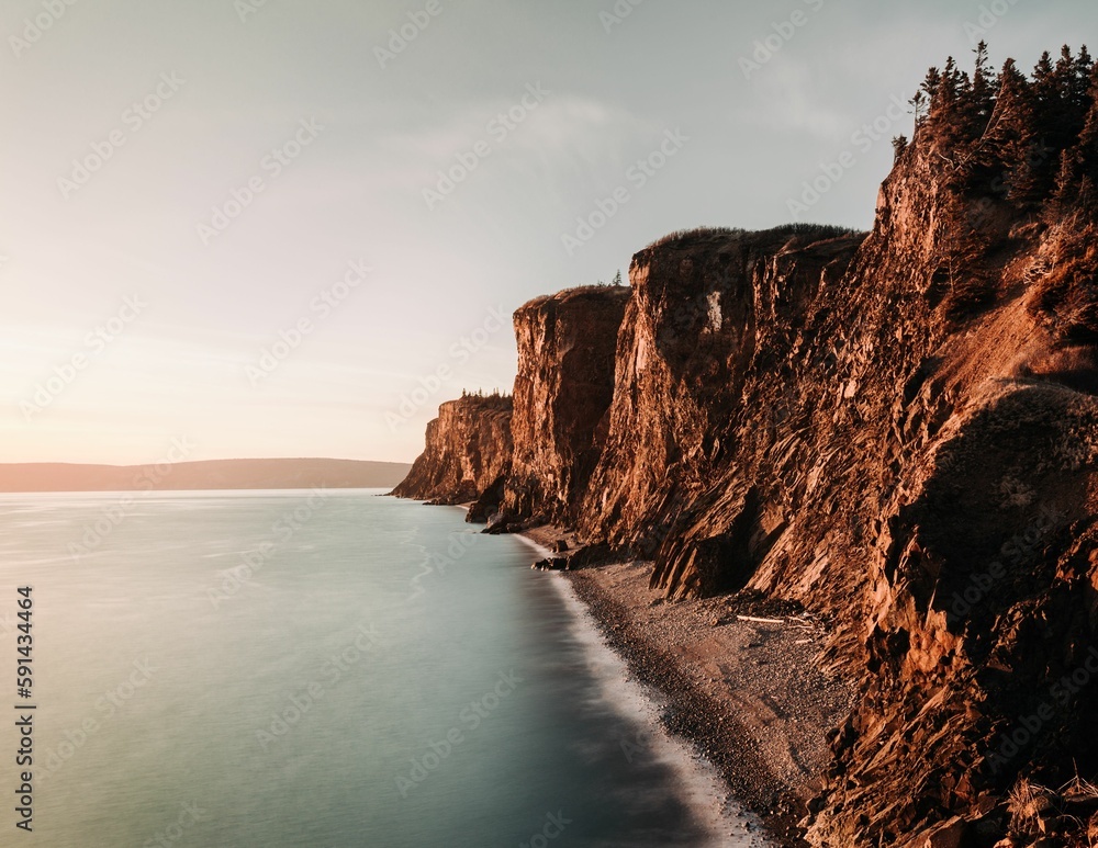 Beautiful view of the coastline with cliffs in sunny weather