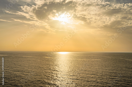 Sunrise view from the sea near Santorini island  Greece.