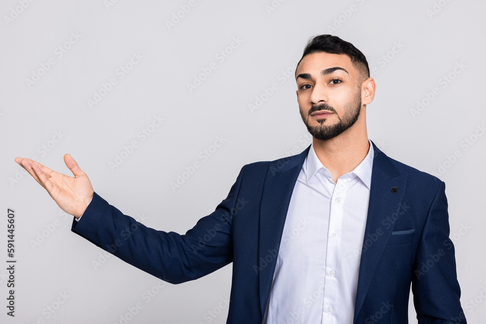 Turkish young handsome man guy wearing stylish smart ellegant suit costume and white shirt buisnessman over grey background in studio isolated. Turkish young handsome man guy wearing stylish smart ellegant suit costume and white shirt buisnessman over grey background in studio isolated.