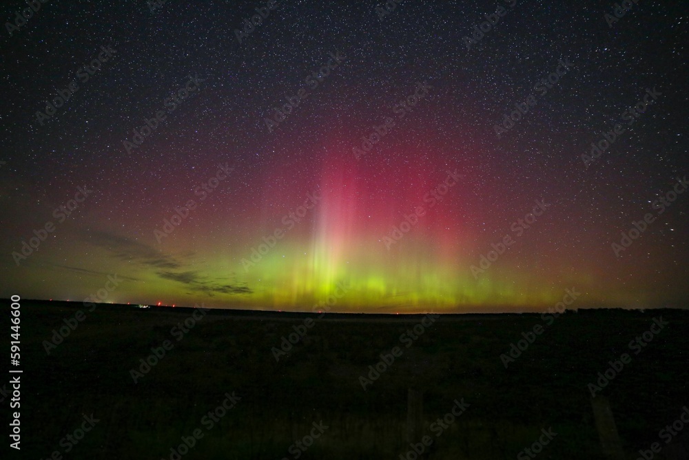 Spectacular night sky with a vivid aurora display and a starry sky - great for wallpapers Spectacular night sky with a vivid aurora display and a starry sky - great for wallpapers