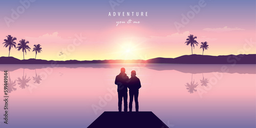 couple in love by the ocean at sunset with mountain and palm tree view