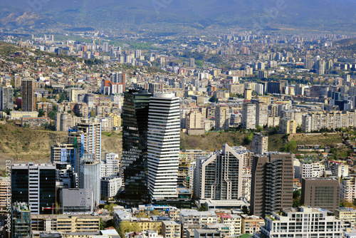 Aerial view of a large modern city with beautiful skyscrapers. © SKfoto