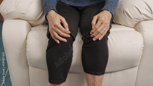Photos knee pain, Asian mature woman close up mature old woman touching knee joint, having painful feelings