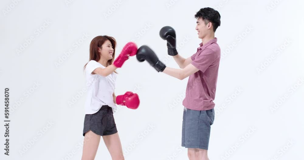 Humorous young couple practicing boxing,4K Humorous young couple practicing boxing,4K
