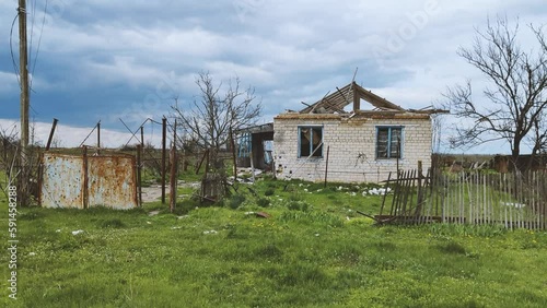 War crime. Civil houses shot down by tanks and destroyed by artillery by Russian occupiers. Ukrainian village in the Kherson region is completely destroyed by the Russians in 2022, exact date unknown photo