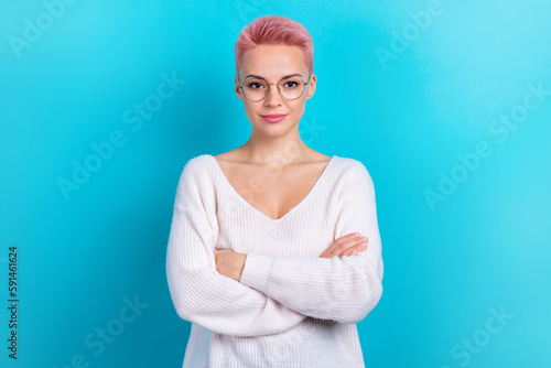 Photo of confident pretty business lady crossed arms successful reporter wear white pullover new vision glasses isolated on cyan color background © deagreez