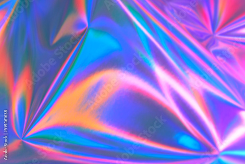 Blurred ethereal pastel neon pink, purple, mint blue holographic metallic foil background texture. Abstract futuristic rainbow disco, rave, festive backdrop, Lo-fi multicolor vintage retro design photo