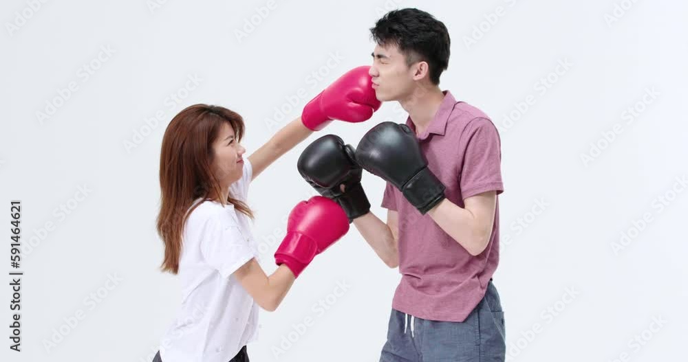 Humorous young couple practicing boxing,4K Humorous young couple practicing boxing,4K