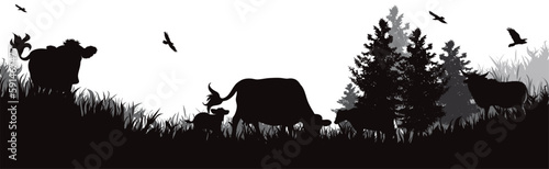 Vector silhouette of cows grazing in the meadow.