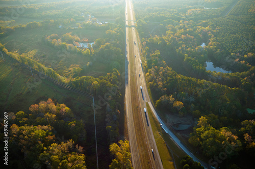 Aerial view of busy american highway with fast moving traffic. Interstate transportation concept