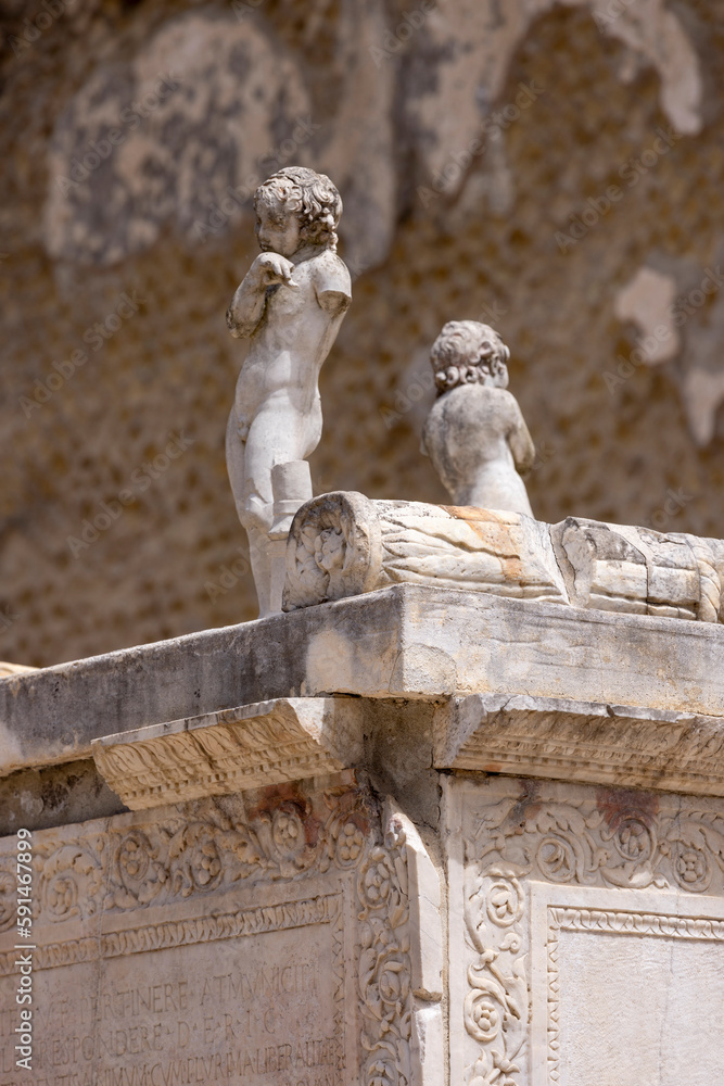 Statues on the pedestal of the monument of Marcus Nonius Balbus, Herculaneum, Campania, Italy