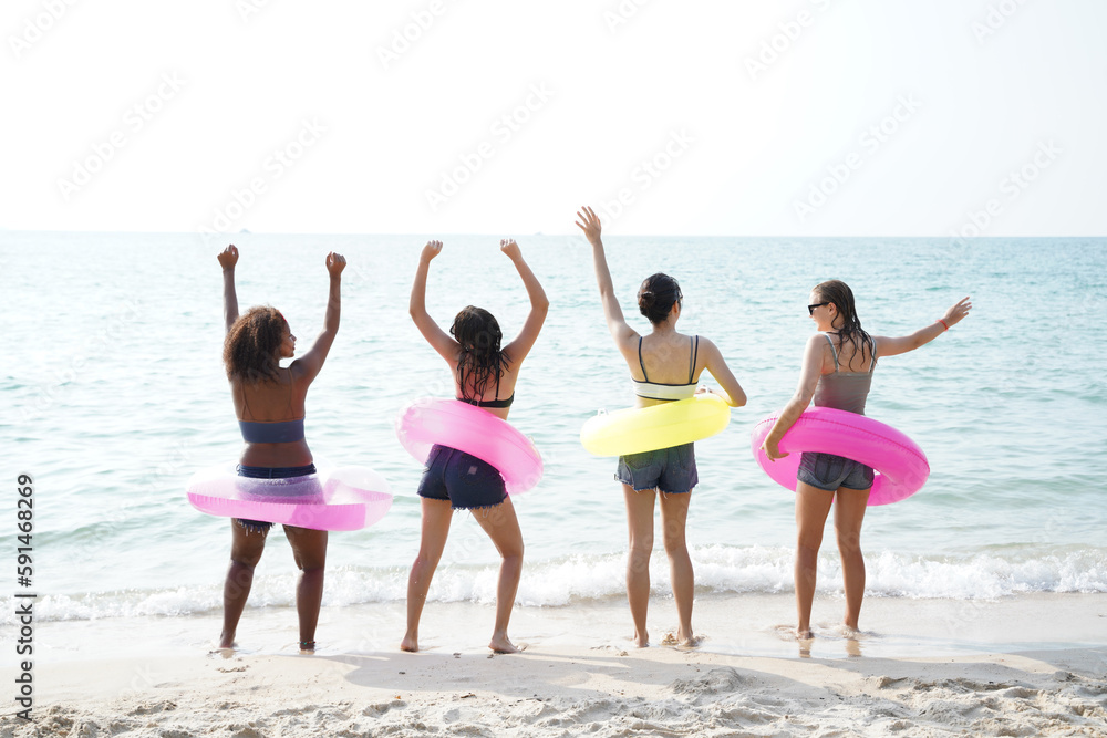 Friends fun together on the beach,Friends vacation beach carefree relax concept.