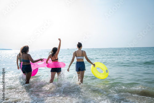 Holiday summer with friends on the beach,Having fun in the sea,Lifestyle people vacation holiday on beach.