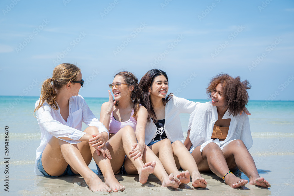 Young woman playing together on tropical beach at summer,Summer vacation concept. Young woman playing together on tropical beach at summer,Summer vacation concept.