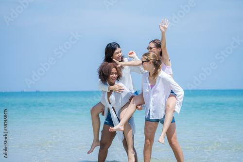 Happy female friends enjoy and fun outdoor activity lifestyle on holiday travel vacation at the sea,Friends fun together on the beach.