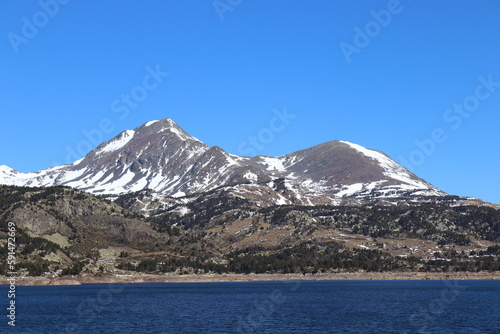Lake on the Ascent to Pico Carlit from the Bulloses reservoir. Mont-Louis, Upper Cerdanya, Pyrenees-Orientales, Languedoc-Roussillon, France.
French snowy mountain set in the thawed lakes
