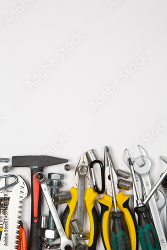 Set of tools for repair in a case on a white background. Assorted work or construction tools. Wrenches, Pliers, screwdriver. Top view