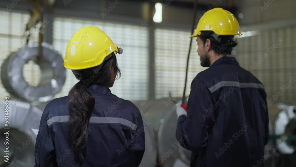 Team engineer checking machine in metal sheet factory. worker or technician check and maintenance metal with professional, industry and machinery concept. Team engineer checking machine in metal sheet factory. worker or technician check and maintenance metal with professional, industry and machinery concept.