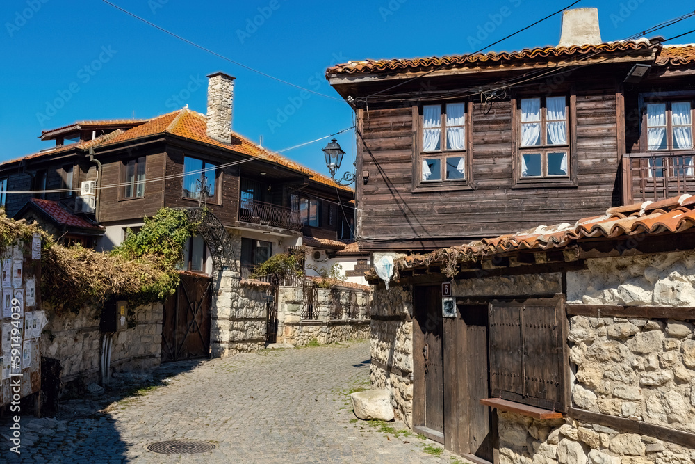 Nessebar old town street view, old stone and wooden houses in Nessebar, UNESCO Heritage site, Bulgaria Nessebar old town street view, old stone and wooden houses in Nessebar, UNESCO Heritage site, Bulgaria