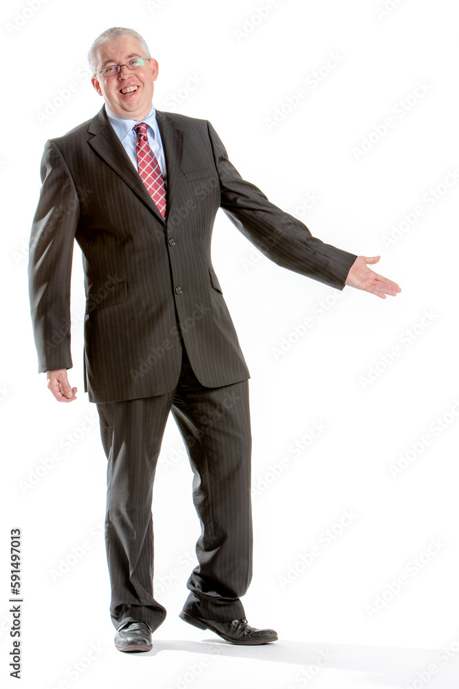 Business Colleagues: Sales Professional. A friendly man presenting to camera. Full length studio isolated on white. From a series of related images. Business Colleagues: Sales Professional. A friendly man presenting to camera. Full length studio isolated on white. From a series of related images.