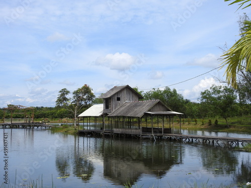 Wooden house at the small lake