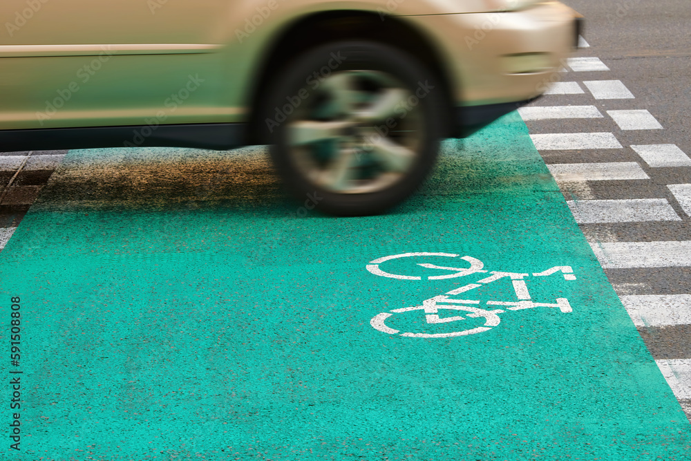 Car Driving Through Bicycle Way Marked With White Paint Pedestrian car-driving-through-bicycle-way-marked-with-white-paint-pedestrian