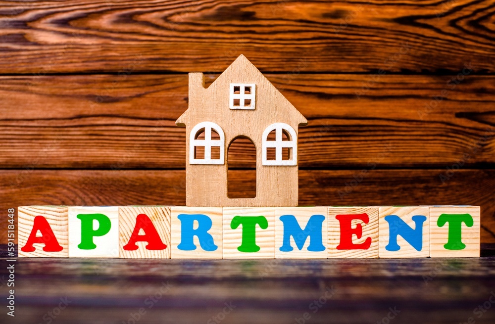 Wooden home and text on the cubes apartment
Wooden home and text on the cubes apartment