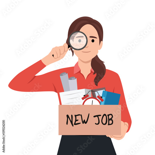 Young woman using magnifying glasses looking for a new job opportunity after getting fired.