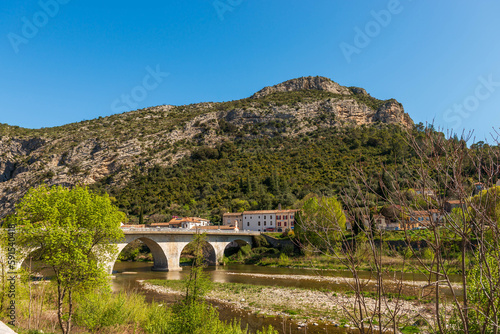 Landscape of the village of Anduze and the river Gardon, in the Cévennes, in Gard, Occitanie, France photo