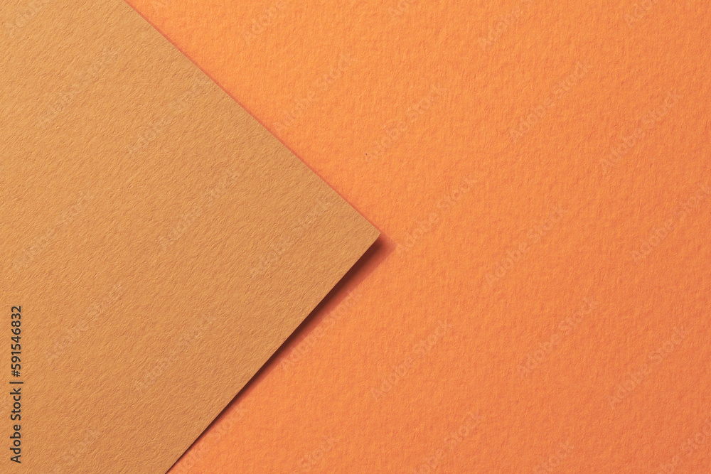 Rough kraft paper background, paper texture different shades of orange. Mockup with copy space for text Rough kraft paper background, paper texture different shades of orange. Mockup with copy space for text
