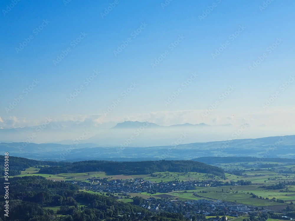Summer background. Panorama of the countryside. Suburbs of Zurich.