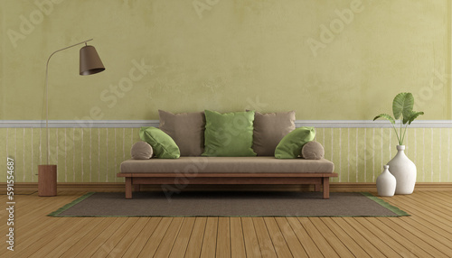 Green living room with wooden sofa