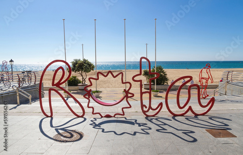 Sign of the town of Rota, Cadiz, Andalusia, Spain in front of the beach