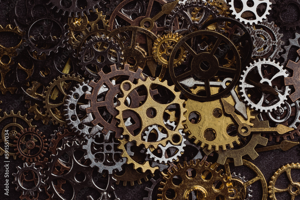 Shiny gears of cold steel colors on dark background Shiny gears of cold steel colors on dark background