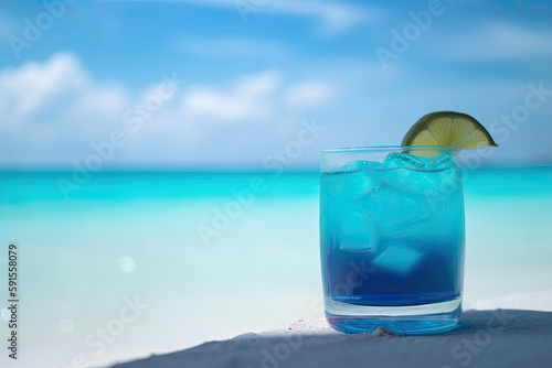 Blue cocktail on the white sand of a paradisiacal beach with the sea in the background. Copy space. Ai generative