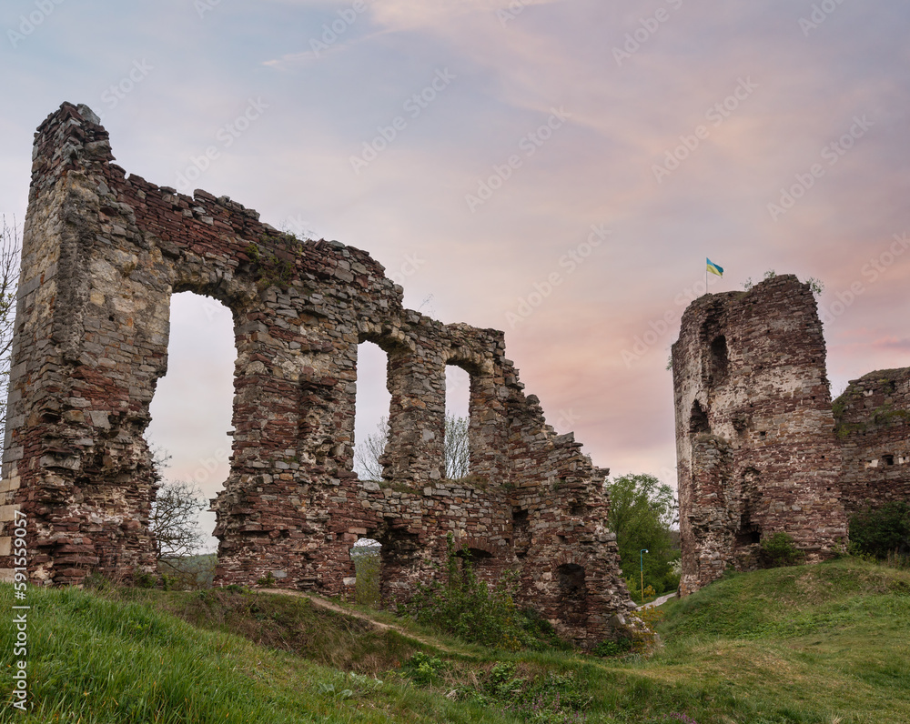 Buchach castle ruins with Ukrainian flag, Ternopil oblast, Ukraine. Dating to 14th century.