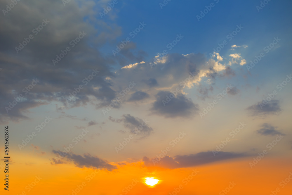 blue cloudy sky at the dramatic sunset, evening sky background