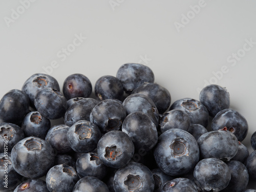 Fresh organic blueberries in a bowl closeup view