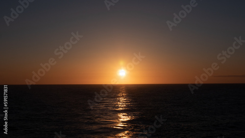 beautiful sunset at sea seascape. beautiful sunset at sea water. photo of sunset at sea. sunset © be free
