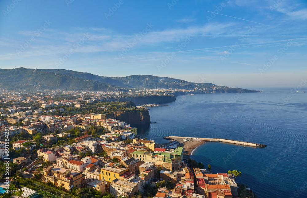 View of Sorento coastline. Landscape of a part of the coast of Sorento, representing old road in the left and the blue sea water with ships in the right.