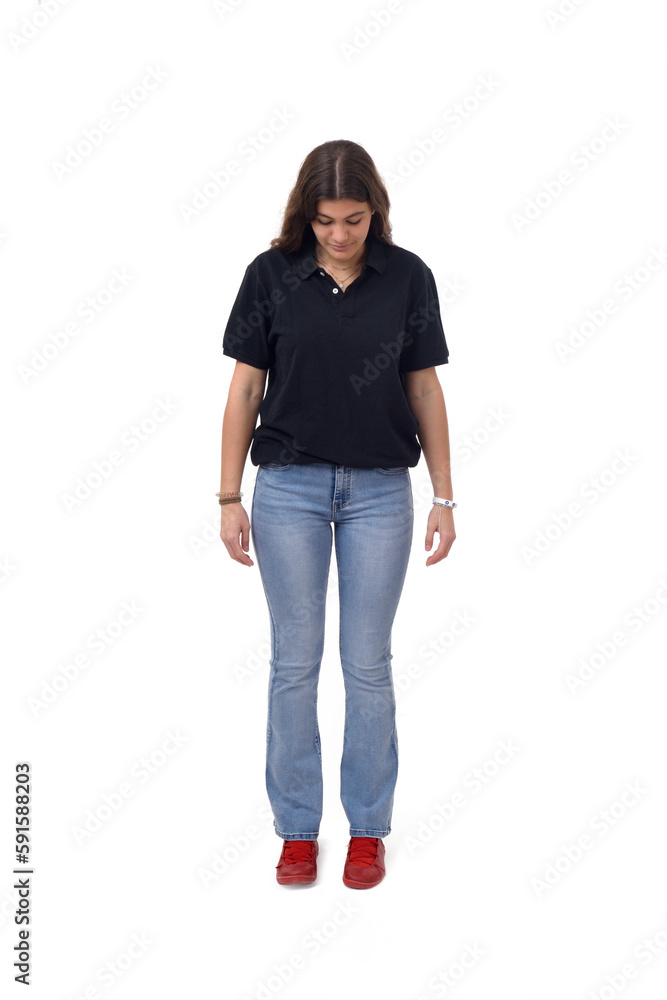 Fototapeta premium front view of young girl looking down the floor on white background