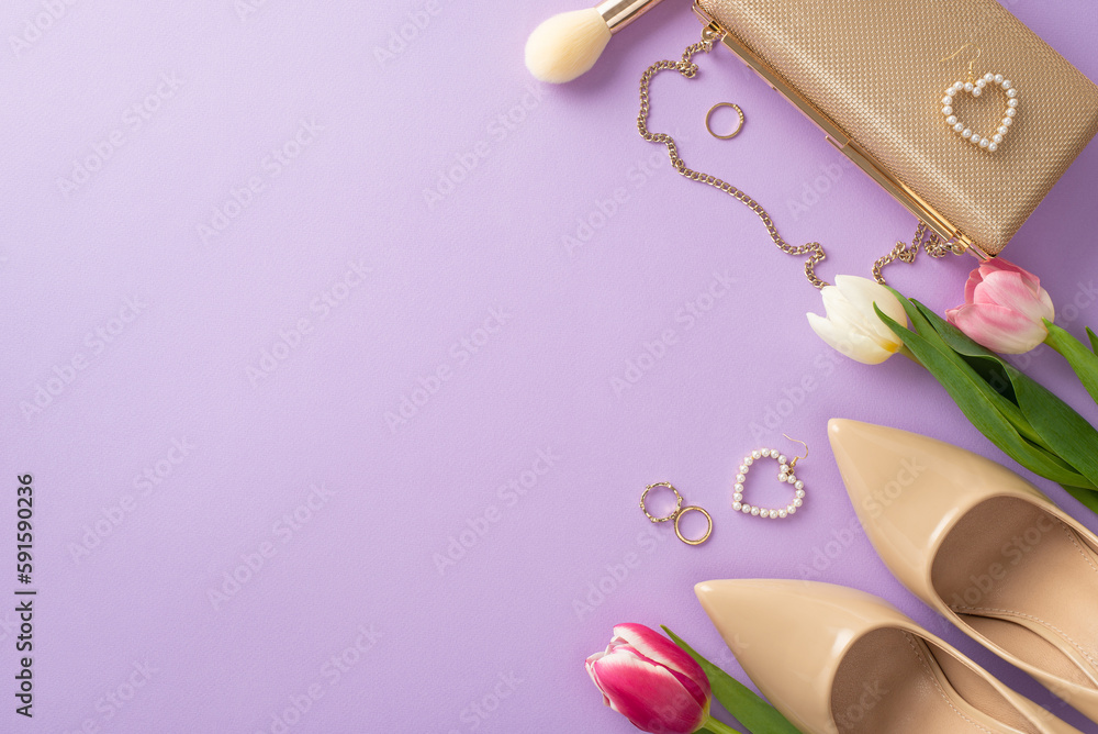 Stylish Mother's day concept. Top view of high-heels, handbag, tulips, makeup brush, earrings on violet background with copy space for greeting text