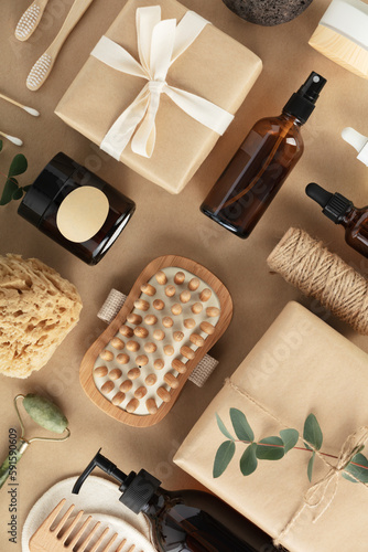 Flat lay composition with eco friendly personal care products on beige background with leaves shadows