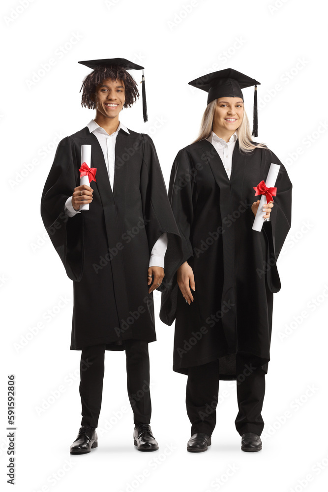 Full length portrait of a caucasian female graduate student and a male african american student holding certificates Full length portrait of a caucasian female graduate student and a male african american student holding certificates