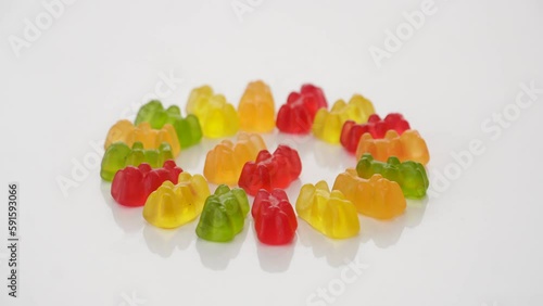 Gold bears. Animal gummy candies. Isolated on white background