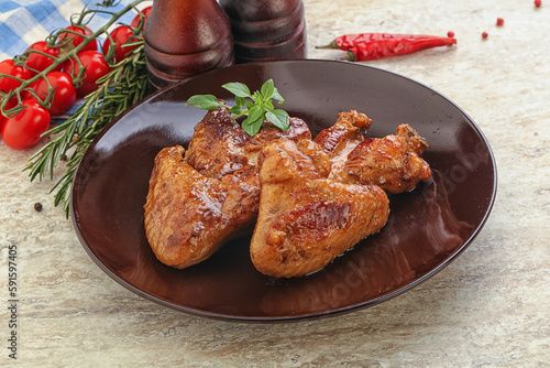 Roasted chicken wings with spicy sauce